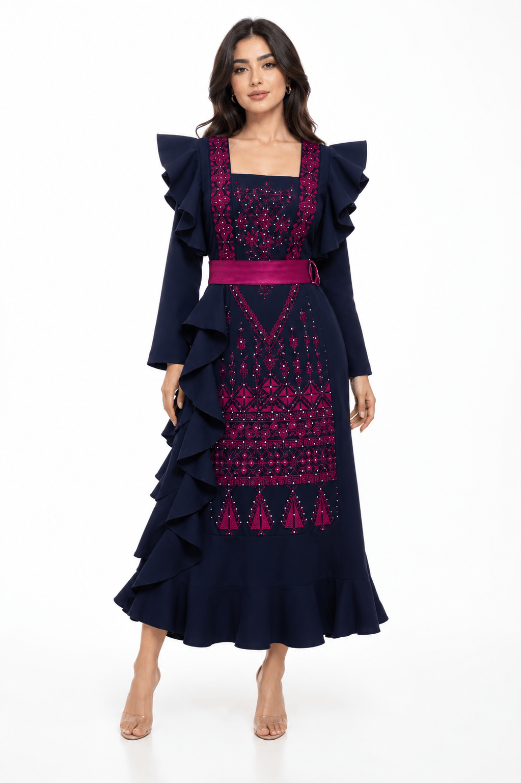 Dalaa Modern Palestinian Dress featuring intricate embroidery and feminine ruffles, showcasing contemporary Middle Eastern fashion.