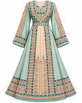 Modern Palestinian Dress featuring intricate embroidery and a contemporary silhouette in soft colors.
