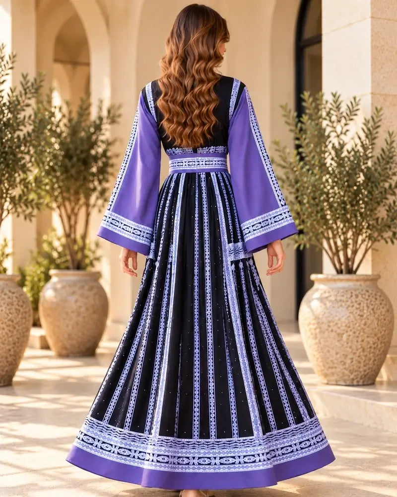 Elegant Embroidered Dress showcasing traditional Jordanian embroidery and modern silhouette in black and purple.