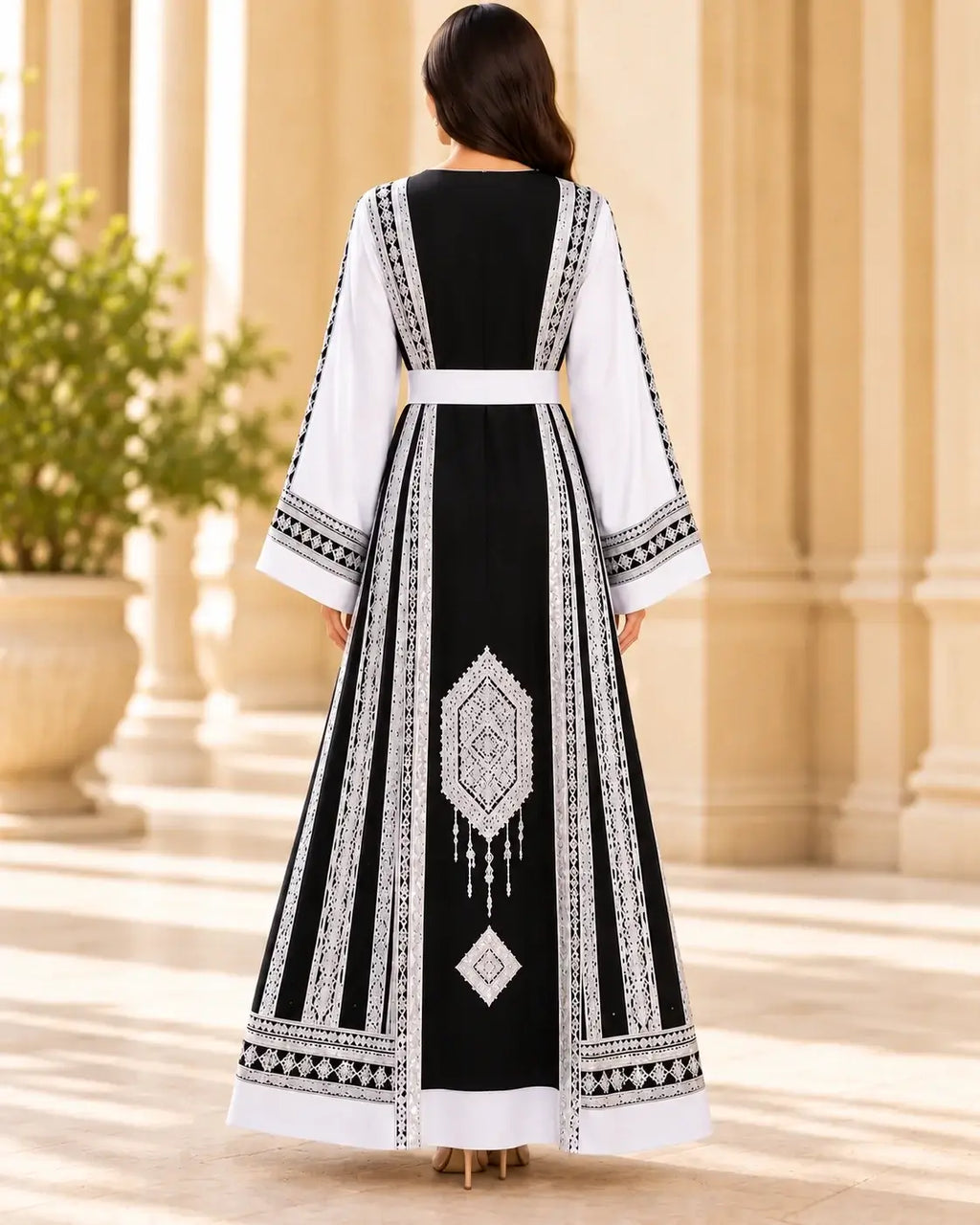Elegant Embroidered Dress showcasing intricate Jordanian-inspired embroidery from the back view.