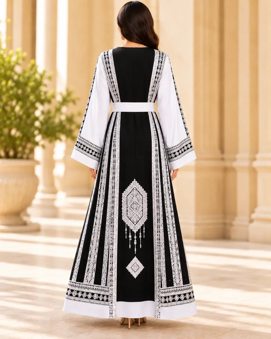 Elegant Embroidered Dress showcasing intricate Jordanian-inspired embroidery from the back view.