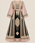 Elegant Embroidered Dress featuring traditional Jordanian-inspired embroidery and a modern silhouette.