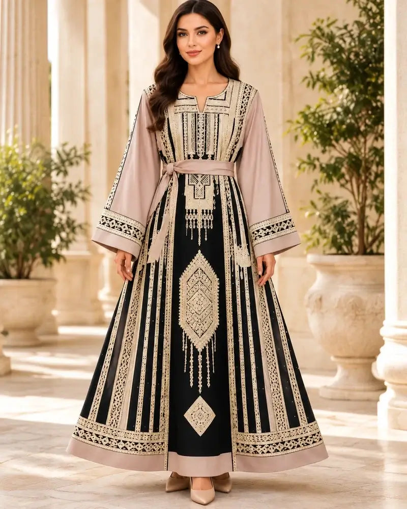 Elegant Embroidered Dress showcased in a beautiful setting, featuring Jordanian-inspired embroidery with a modern silhouette.