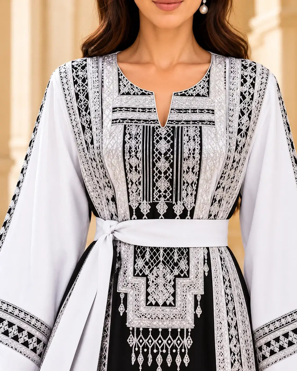 Elegant Embroidered Dress featuring intricate Jordanian-inspired embroidery and a modern silhouette.