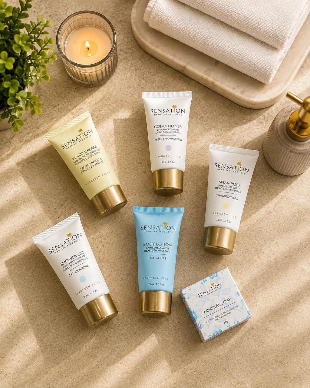 Dead Sea travel essentials set featuring shampoo, conditioner, body lotion, shower gel, and hand cream.