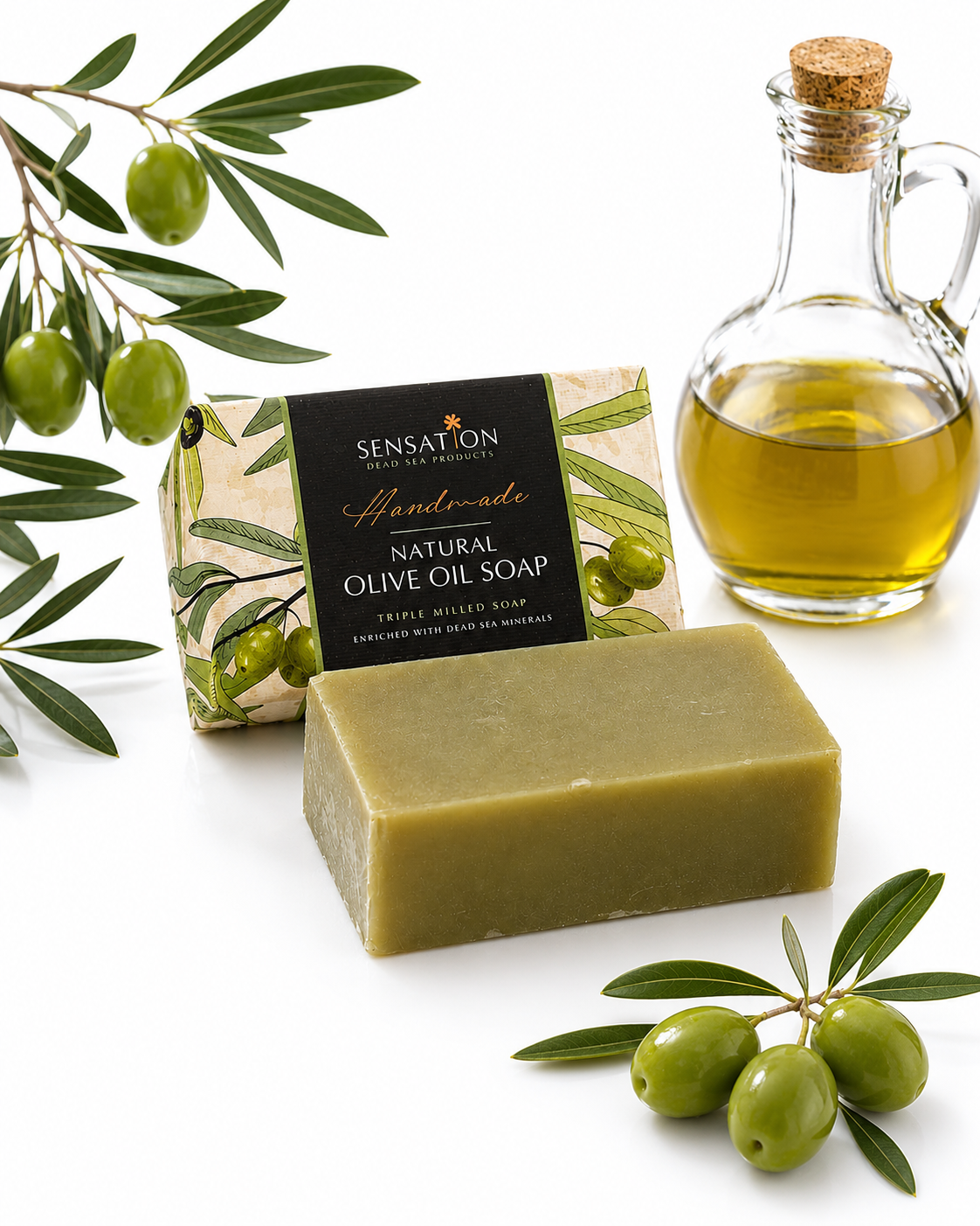 Natural handmade vegetal soap with olive oil, surrounded by fresh olives and an olive oil bottle.