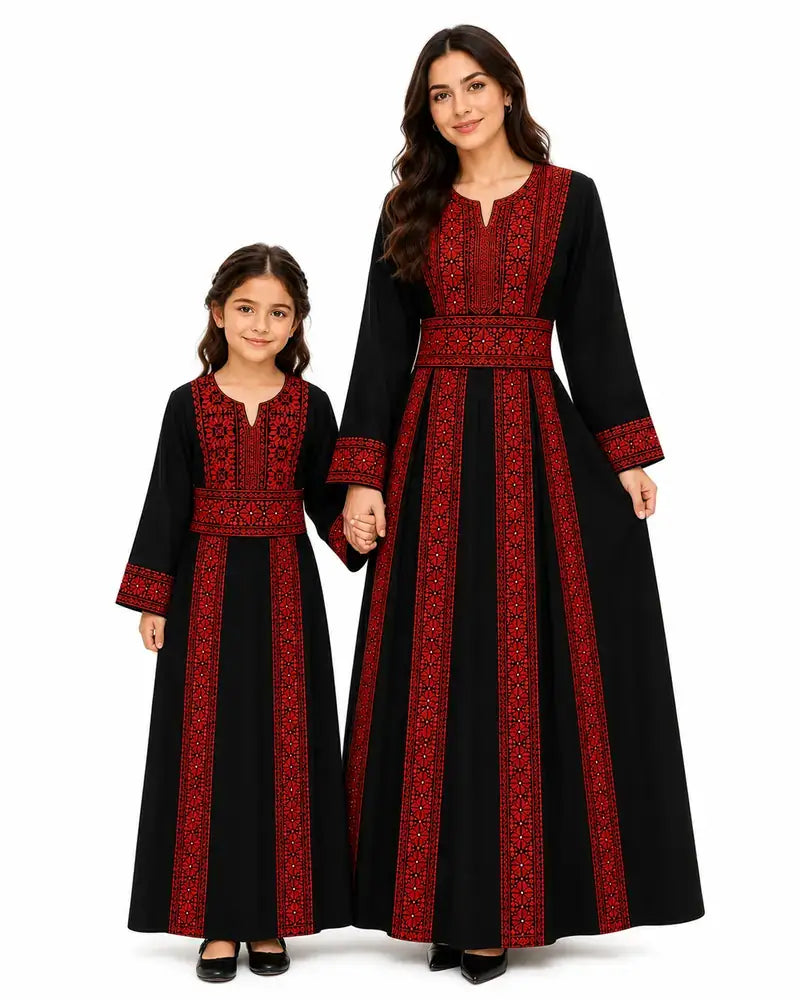 Traditional Palestinian thobe with red embroidery worn by a woman and a girl, showcasing cultural elegance and style.