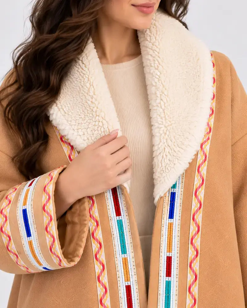 Women's traditional Jordanian Farwa winter coat worn by model